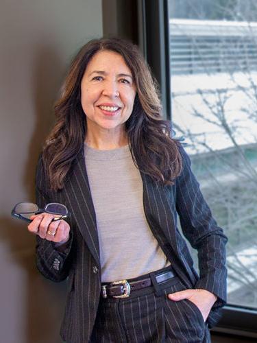 bel<s:1> Rodríguez Mourelo stands in an office in the Gaige Building.